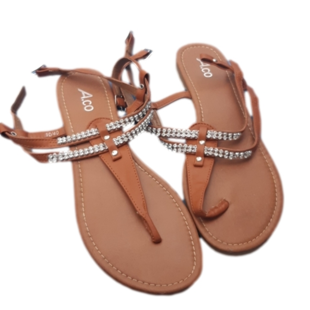 Woman wrap flat sandles size 10 tan colour with jewel accent gladiator style